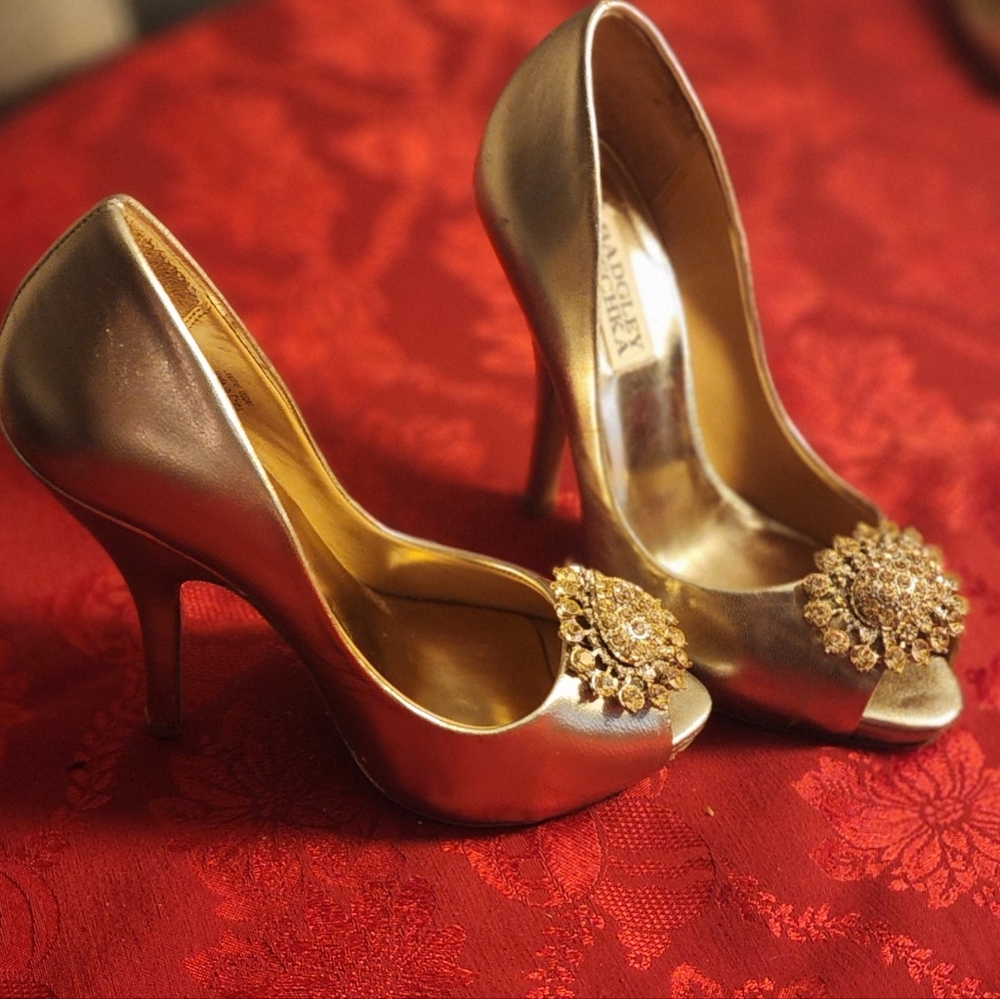 Badgley Mischka gold heels with rhinestone embellishments, size 6